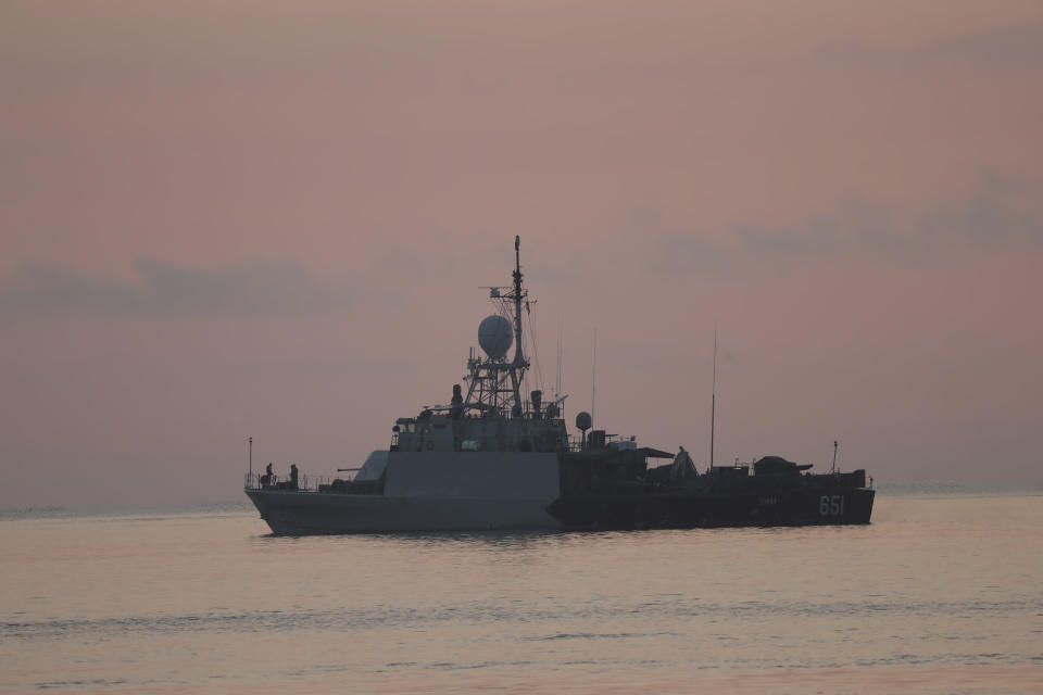 An Indonesian navy patrol ship sails to join the search for submarine KRI Nanggala that went missing while participating in a training exercise on Wednesday, off Banyuwangi, East Java, Indonesia Sunday, April 25, 2021. Indonesia’s navy on Saturday declared its missing submarine had sunk and cracked open after finding items from the vessel over the past two days, apparently ending hope of finding any of the 53 crew members alive. (AP Photo/Achmad Ibrahim)