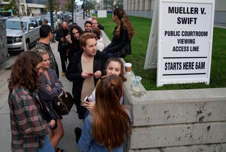 Taylor Swift fans wait outside Denver Federal Court where the Taylor Swift groping trial jury selection is to resume in Denver, U.S., August 8, 2017. REUTERS/Rick Wilking