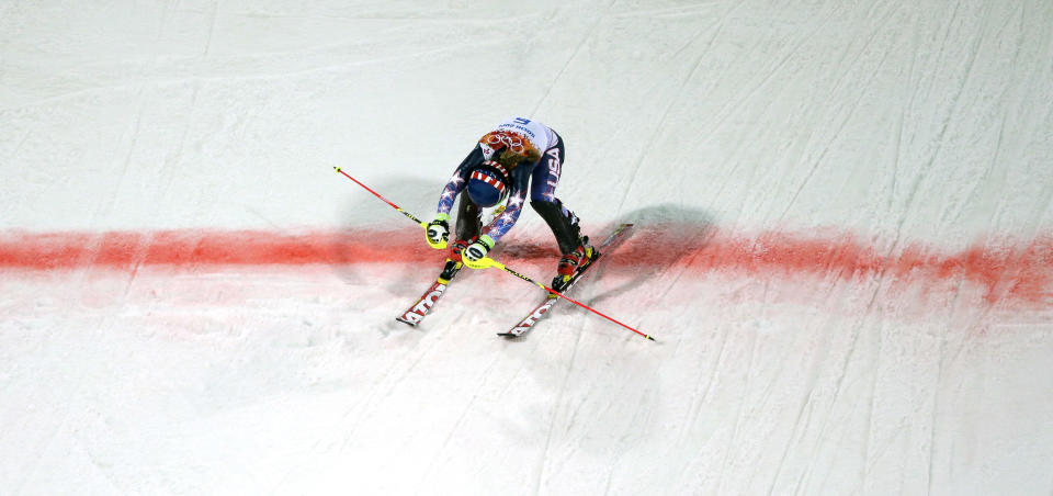 Gold medal winner Mikaela Shiffrin crosses the finish line in the women's slalom at the Sochi 2014 Winter Olympics, Friday, Feb. 21, 2014, in Krasnaya Polyana, Russia. (AP Photo/Charlie Riedel)