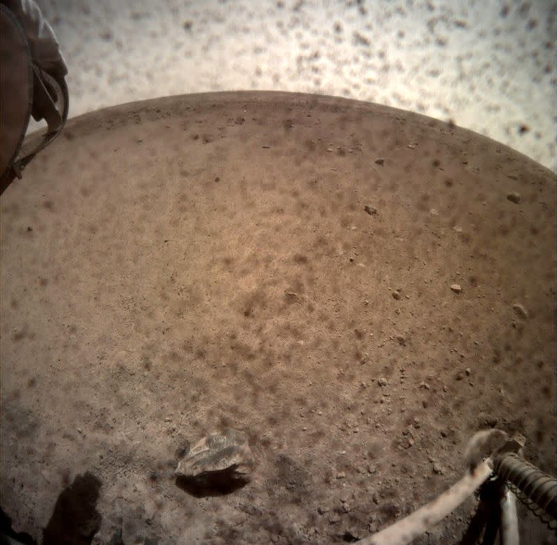 FILE PHOTO: An image acquired by NASA's InSight Mars lander shows the area in front of the lander using its lander-mounted, Instrument Context Camera