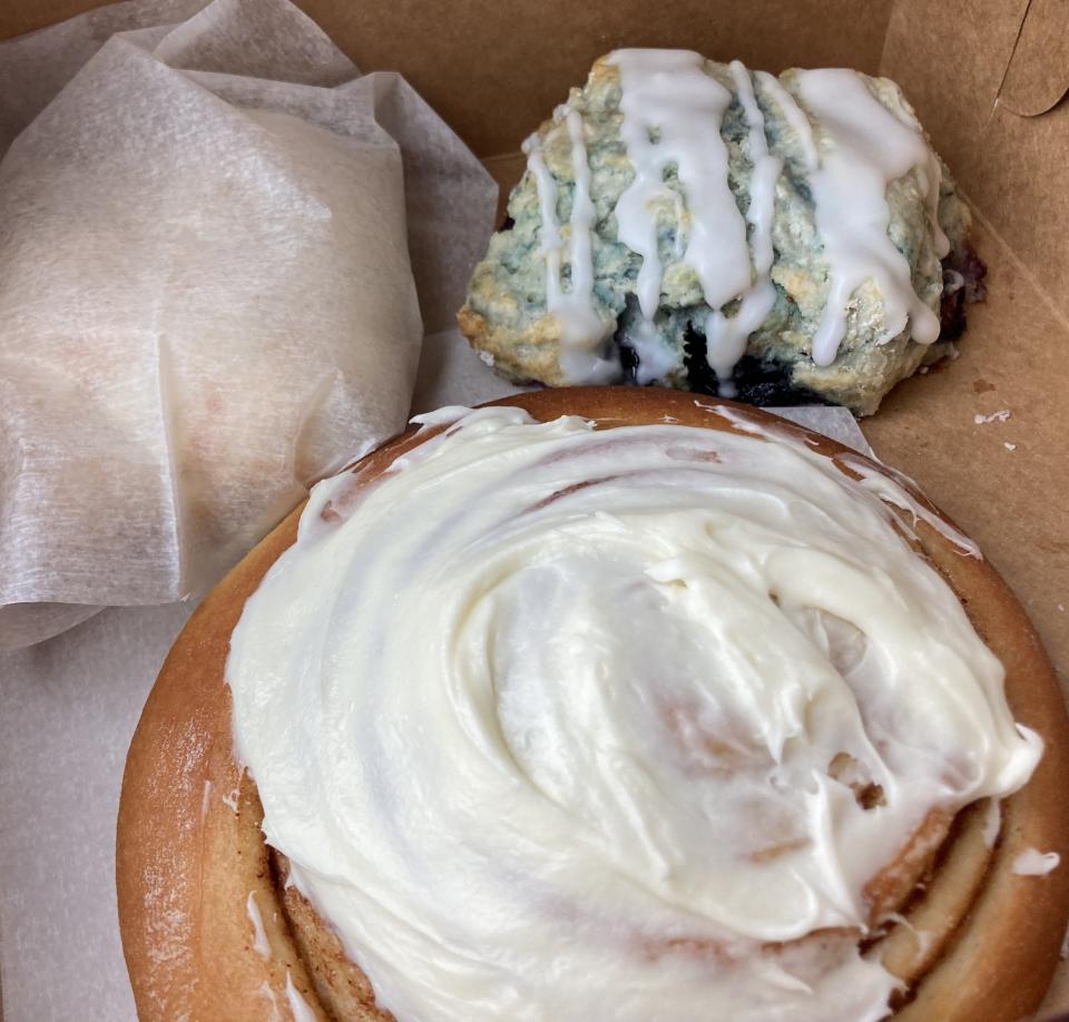 A cinnamon roll and blueberry biscuit from The Jelly Cabinet bakery at 1011 N. 4th St., in Wilmington, N.C.