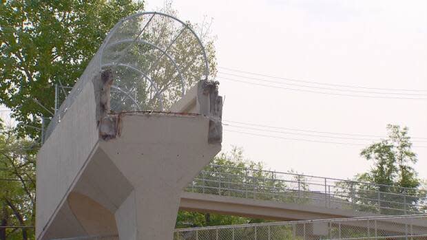 The former footbridge over 170 Street was demolished in 2018 with ramps being the only remaining vestige. (Rod Maldaner/CBC - image credit)