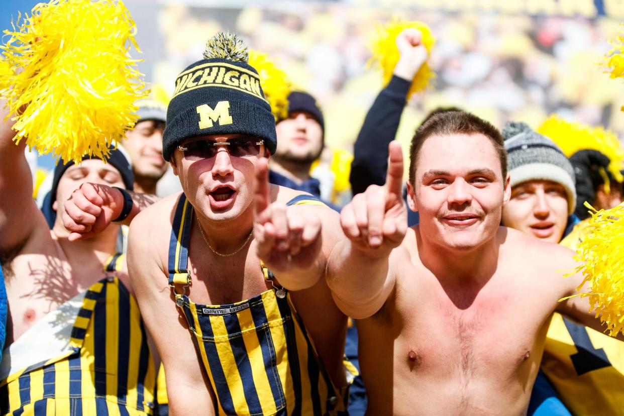 Michigan fans cheer for the Wolverines against Ohio State during the first half at Michigan Stadium in Ann Arbor on Saturday, Nov. 25, 2023.