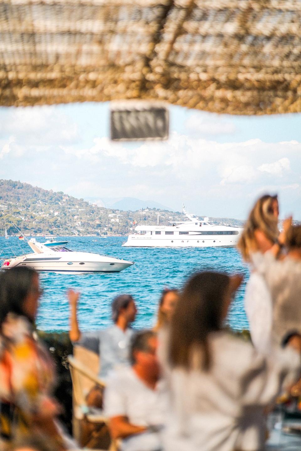 Speed boats and yachts dock alongside Ile Sainte-Marguerite for La Guérite Cannes.