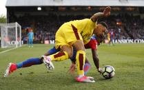 <p>Burnley’s Andre Gray in action with Crystal Palace’s Wilfried Zaha </p>