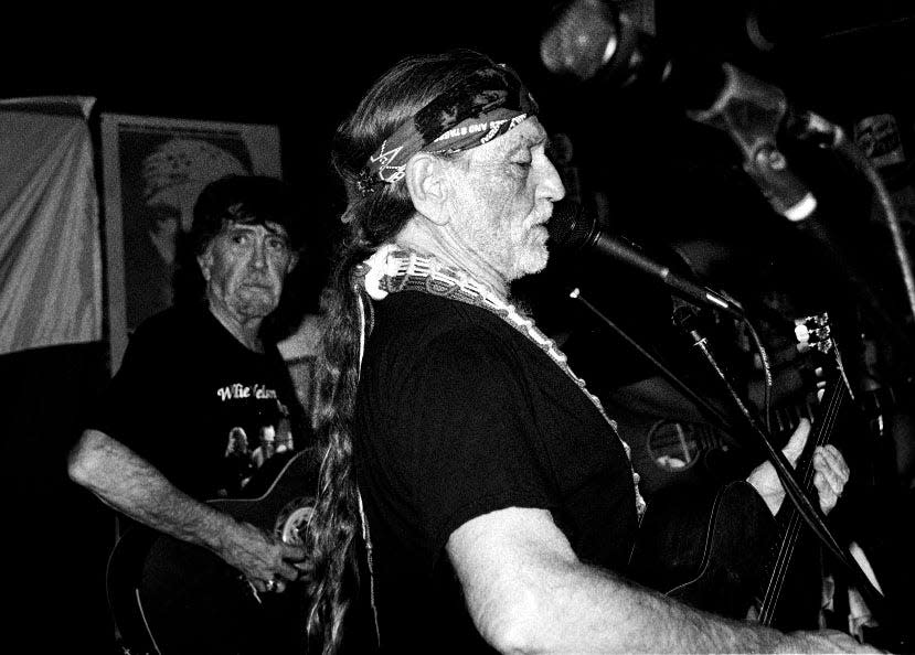 Willie Nelson and guitarist Jody Payne play a benefit show for Nelson's longtime manager Poodie Locke. Payne, who is the father of Nashville musician Waylon Payne, played guitar for Nelson for decades.