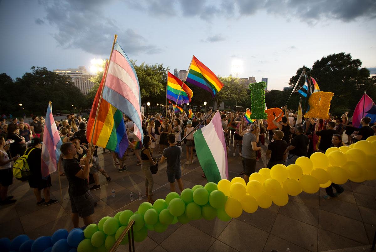 Activists and members of Austin's LGBTQ community gather on the steps of the capitol to celebrate the anniversary of the 1969 Stonewall riots. These riots signify a key moment in the birth of the modern LGBT movement in America. June 28, 2017.