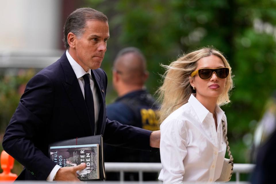 Hunter Biden, left, arrives at the federal court with his wife, Melissa Cohen Biden, June 6, 2024, in Wilmington (AP)