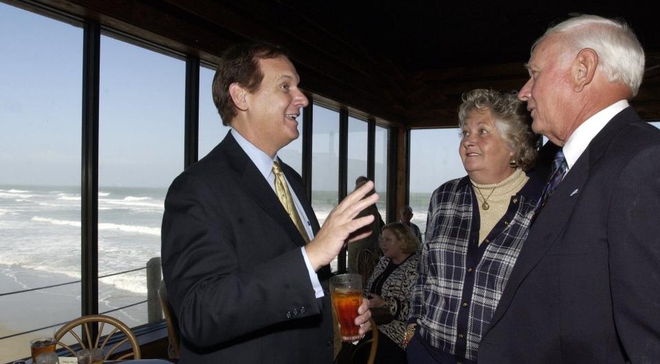 Johnnie Byrd, left, speaker of the Florida House, chats with Cynthia and Jim Handley during a December 2003 luncheon at the Cocoa Beach Pier. At the time, Cynthia was chair of Brevard's George W. Bush presidential campaign, while Jim was chair of the Brevard Community College board of trustees.