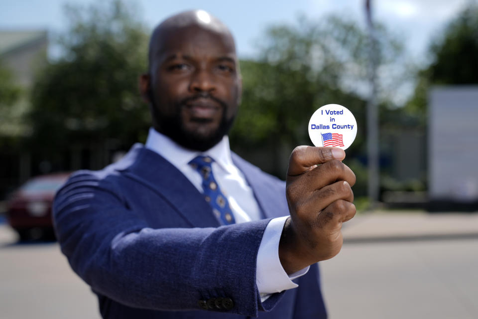 Abdul Dosunmu, the founder of the Young Black Lawyers Organizing Coalition, poses for a photo outside a voting location in Dallas, Monday, April 29, 2024. (AP Photo/Tony Gutierrez)
