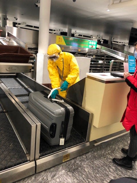 The Blouins check in for their flight out of Wuhan, China on Feb. 4, 2020.