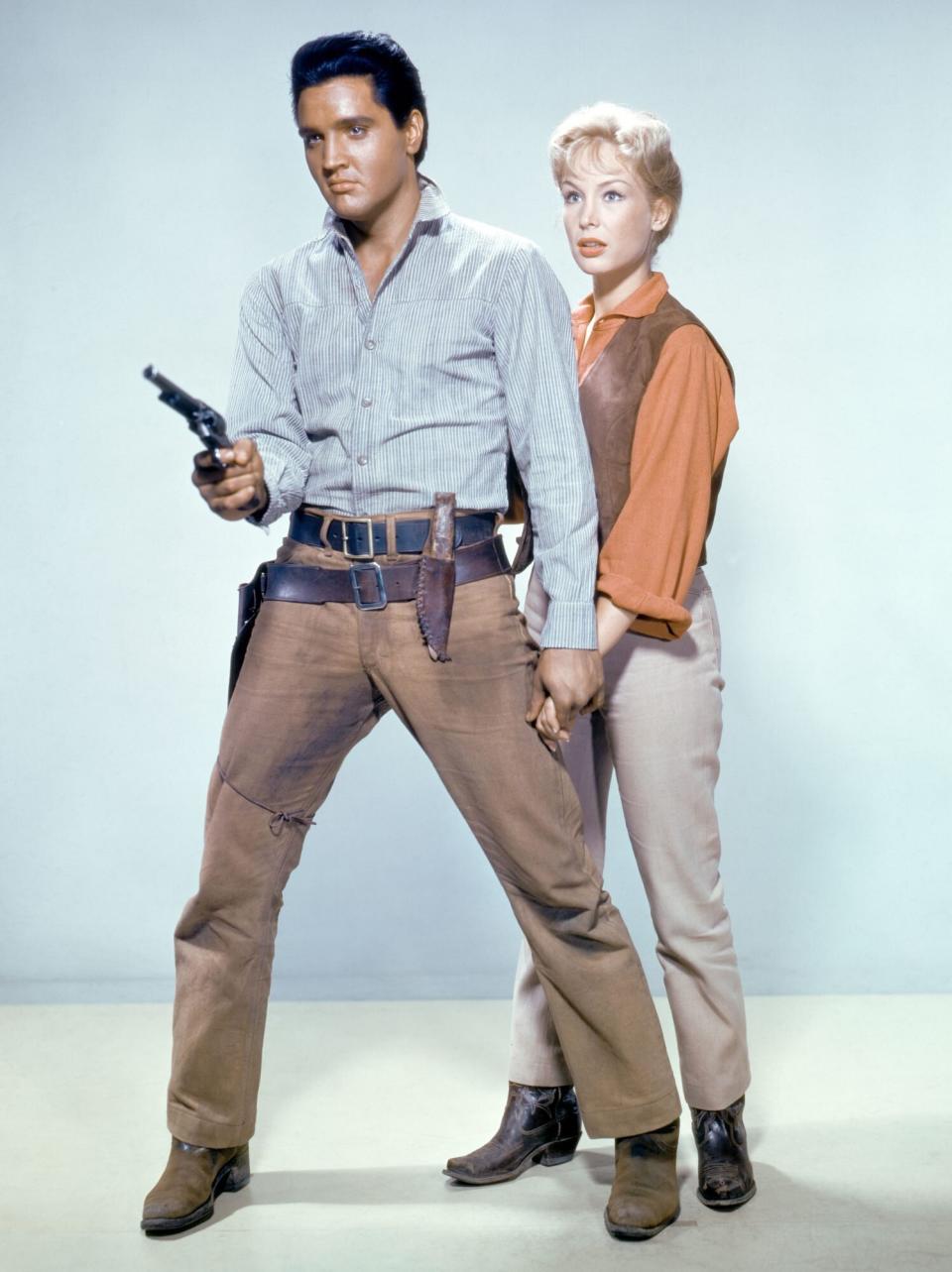 Elvis Presley and Barbara Eden promoting Flaming Star (Photo by Sunset Boulevard/Corbis via Getty Images)