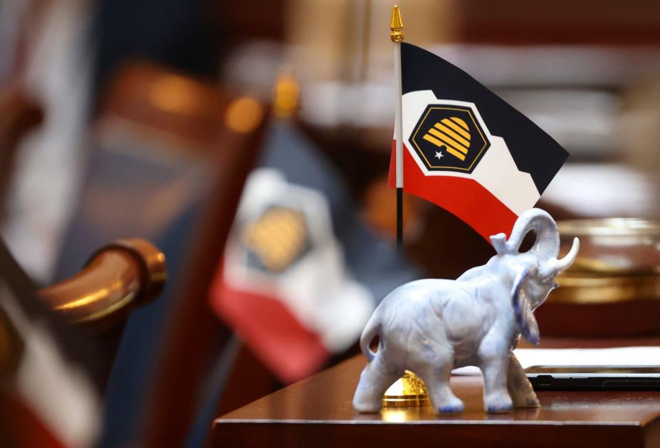 A small replica of the proposed new Utah state flags are displayed on lawmakers’ desks at the Capitol in Salt Lake City, on Feb. 28. Gov. Spencer Cox signed the bill Tuesday that allows for the state flag to be adopted. | Kristin Murphy, Deseret News