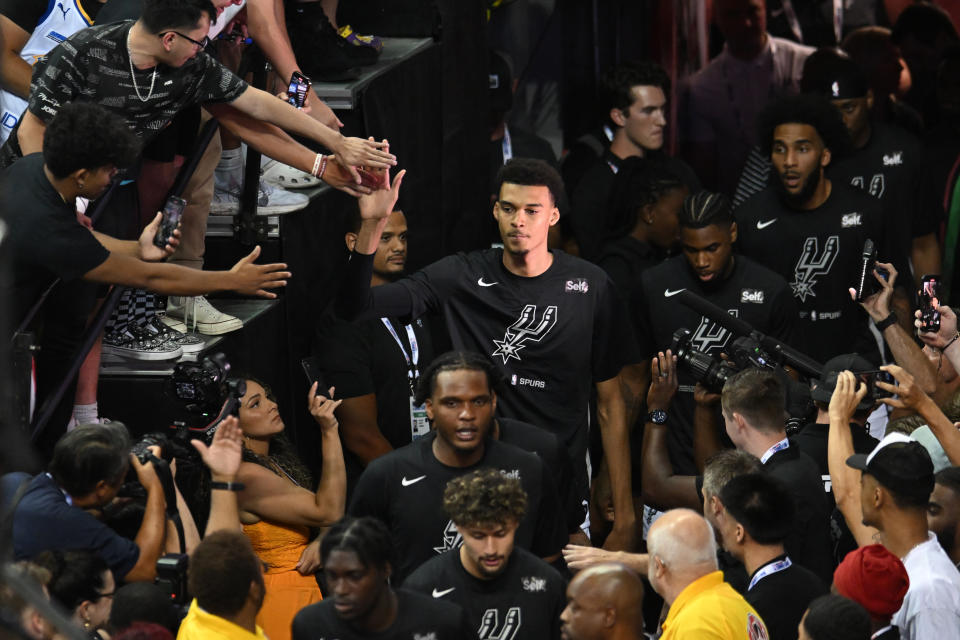 San Antonio Spurs rookie Victor Wembanyama enters the court prior to the game against the Charlotte Hornets at the Thomas & Mack Center in Las Vegas on July 7, 2023. (Candice Ward/Getty Images)