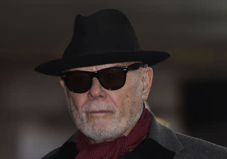 British former pop star Gary Glitter, whose real name is Paul Gadd, leaves Southwark Crown Court in London February 4, 2015. REUTERS/Toby Melville