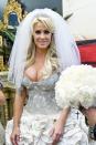 <p>Not to be outdone, this <em>Real Housewives of Atlanta </em>star wore three dresses to her wedding to Kroy <span class="redactor-unlink">Biermann</span>. Her most extravagant (and revealing) was this low-cut, 32-pound Baracci Beverly Hills dress, which reportedly <a href="http://www.dailymail.co.uk/tvshowbiz/article-2062430/Kim-Zolciak-wears-THREE-wedding-outfits-1-million-nuptials.html" rel="nofollow noopener" target="_blank" data-ylk="slk:set her back $58,000;elm:context_link;itc:0;sec:content-canvas" class="link ">set her back $58,000</a>.</p>