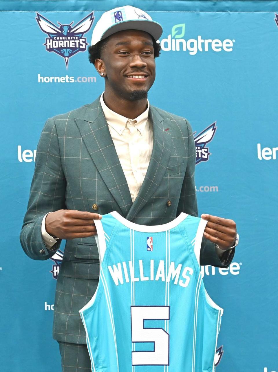 Charlotte Hornets 2022 draft pick Mark Williams poses with his new jersey during an introductory press conference in Charlotte, NC on Friday, June 24 2022.