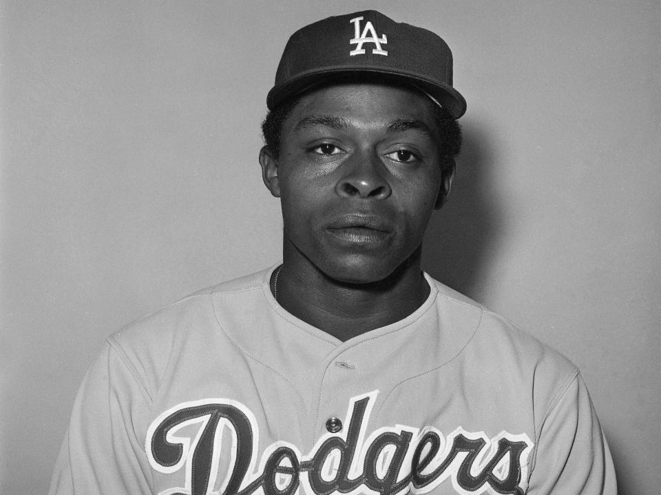 black and white photo of glenn burke in uniform