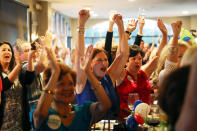 <p>People listen as Republican candidate Karen Handel speaks during a campaign stop at Houck’s Grille as she runs for Georgia’s 6th Congressional District on June 19, 2017 in Roswell, Ga. (Photo: Joe Raedle/Getty Images) </p>