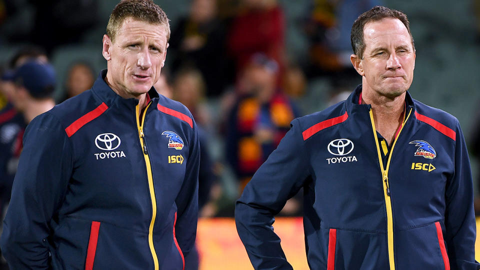 Brett Burton and Don Pyke, pictured hereat an Adelaide Crows game. (Photo by Mark Brake/Getty Images)