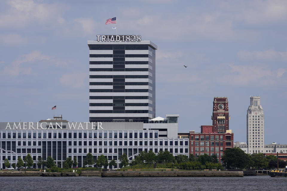 The Triad1828 building is seen on the Camden, N.J. skyline, Monday, June 17, 2024, photographed from across the Delaware River in Philadelphia. (AP Photo/Matt Slocum)