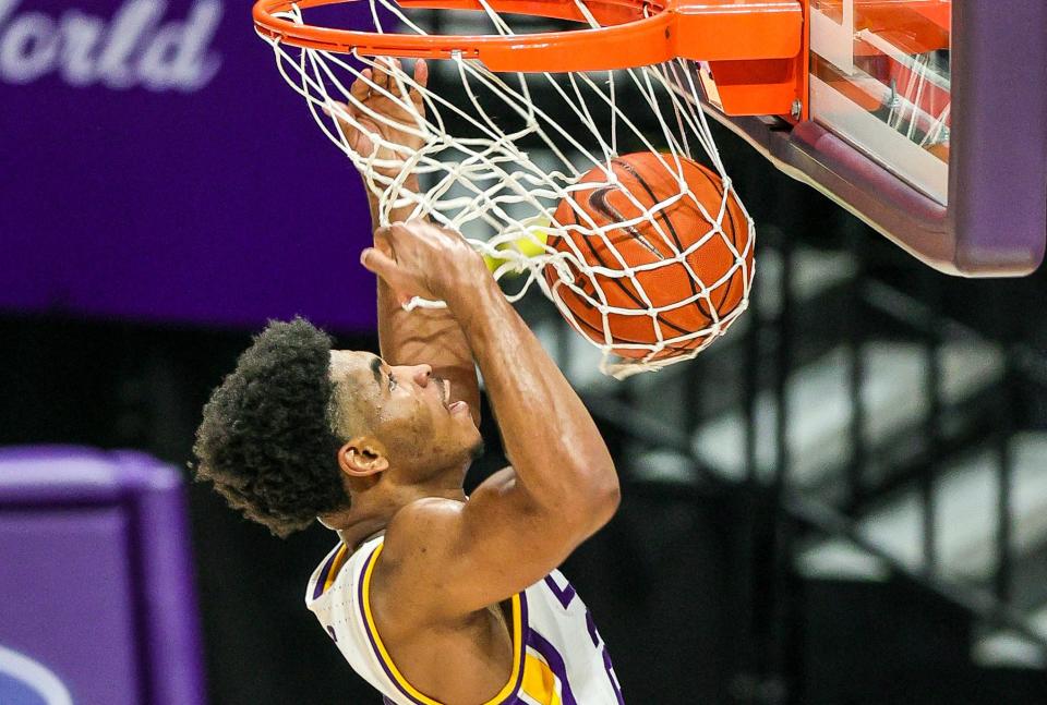 Dec 29, 2020; Baton Rouge, Louisiana, USA;  LSU Tigers guard Cameron Thomas (24) dunks the ball against the Texas A&M Aggies on a steal during the second half at Pete Maravich Assembly Center. Mandatory Credit: Stephen Lew-USA TODAY Sports ORG XMIT: IMAGN-439333 ORIG FILE ID:  202012.29_jrs_la1_160.JPG