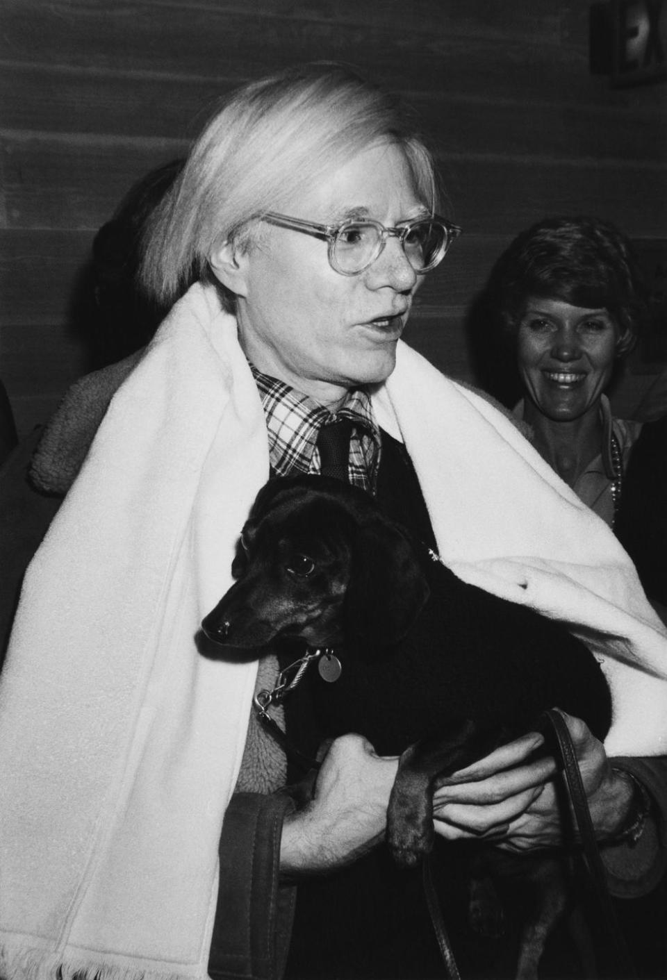 <p>Even New York City's social elite ate at McDonald's back in the day! Here, Andy Warhol attends a black tie dinner hosted at a McDonald's on Fifth Avenue in aid of the Muscular Dystrophy Association. His plus one? His beloved dachshund, Archie.</p>