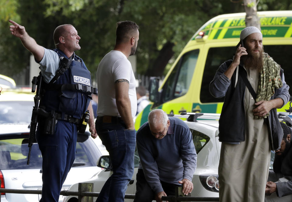 Police attempt to clear people from outside a mosque in central Christchurch after a mass shooting in New Zealand on March 15, 2019.&nbsp;