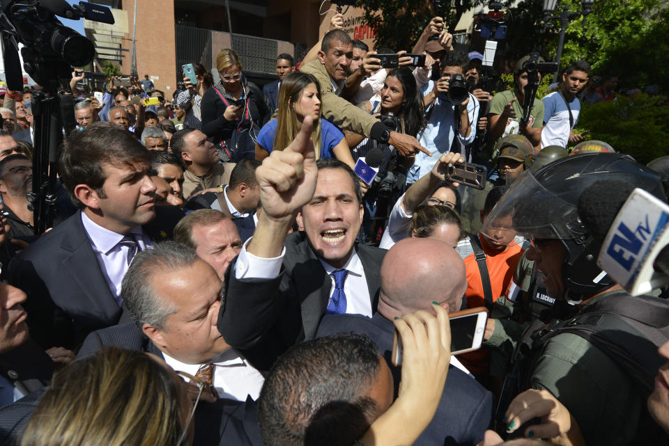 Opposition leader Juan Guaidó argues for National Guards to let him and all opposition lawmakers into the National Assembly, outside the legislature in Caracas, Venezuela, Tuesday, Jan. 7, 2020. Venezuela’s opposition is facing its biggest test yet after government-backed lawmakers announced they were taking control of what Guaidó supporters have described as the nation’s last democratic institution. (AP Photo/Matias Delacroix)