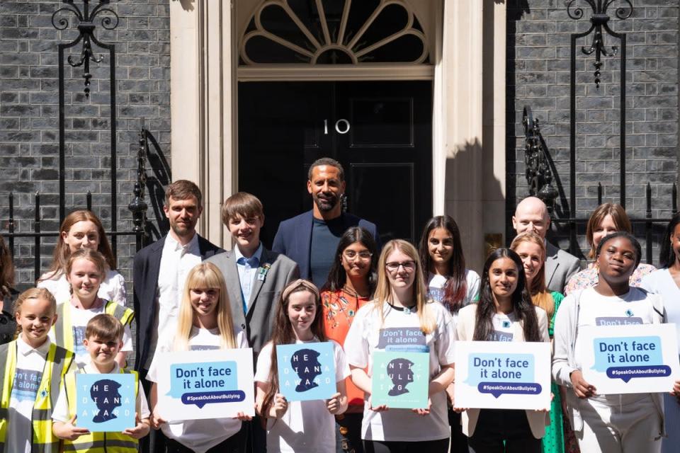 Rio Ferdinand poses for photographs with children at 10 Downing Street to celebrate the launch of the Diana Award’s annual anti-bullying campaign Don’t Face It Alone (Stefan Rousseau/PA) (PA Wire)
