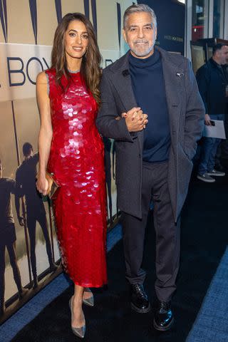 <p>Mat Hayward/Getty</p> Amal and George Clooney at Seattle screening