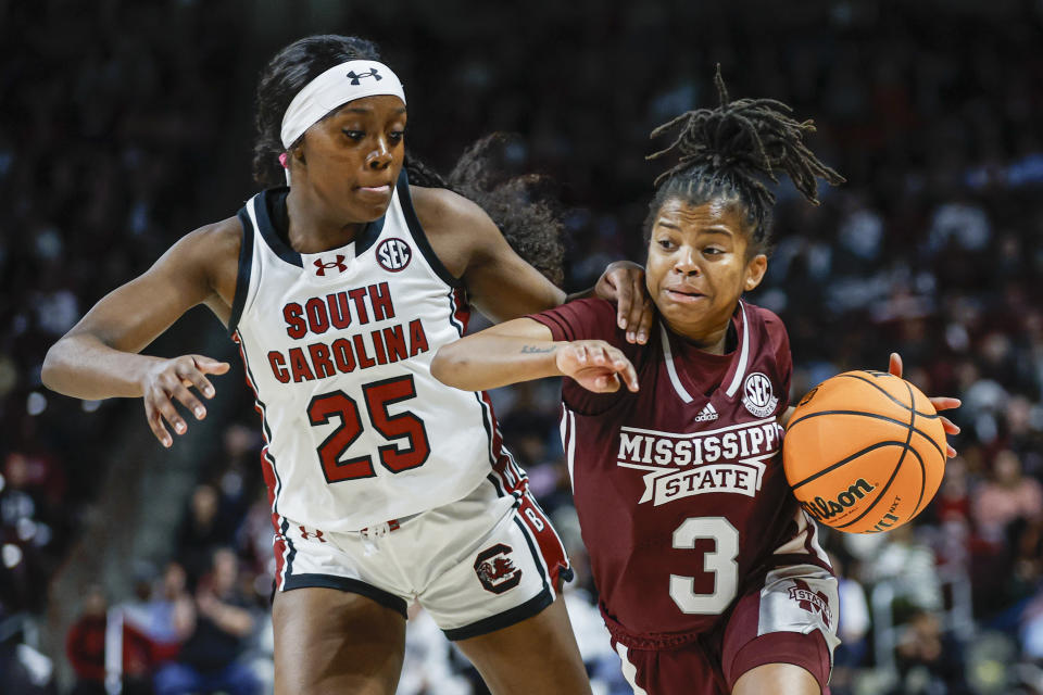 Mississippi State guard Lauren Park-Lane (3) drives against South Carolina guard Raven Johnson during the second half of an NCAA college basketball game in Columbia, S.C., Sunday, Jan. 7, 2024. (AP Photo/Nell Redmond)