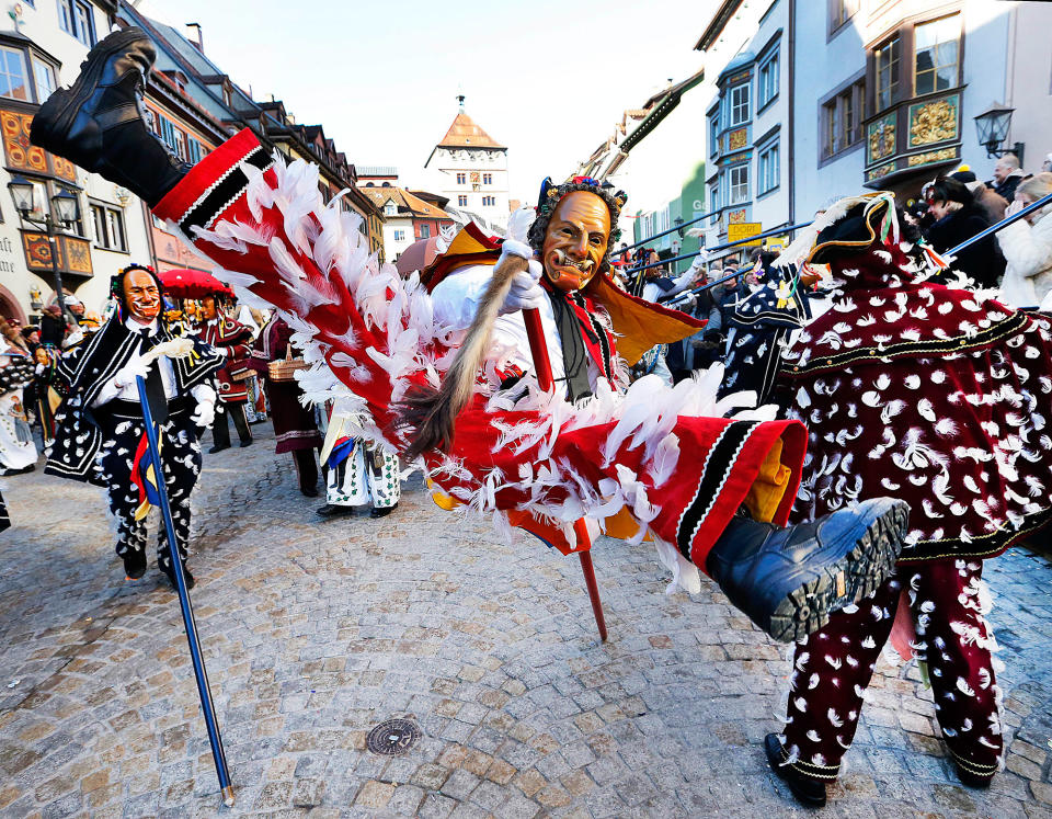 <p>A “Federahannes,” a jester figure from Rottweil, participates in the “Narrensprung” (jester jump) parade in Rottweil, southern Germany, Feb. 27, 2016. About 4000 jesters paraded through the city among thousands of spectators. The Rottweil Narrensprung is the highlight of the Swabian-Alemannic Fastnacht and one of the traditional pre-Lenten carnival parades in southwestern Germany. (AP Photo/Michael Probst) </p>