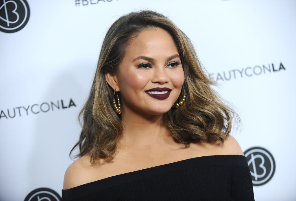 Chrissy Teigen shared the tattoos she *almost* got, and they’re extremely early 2000s
