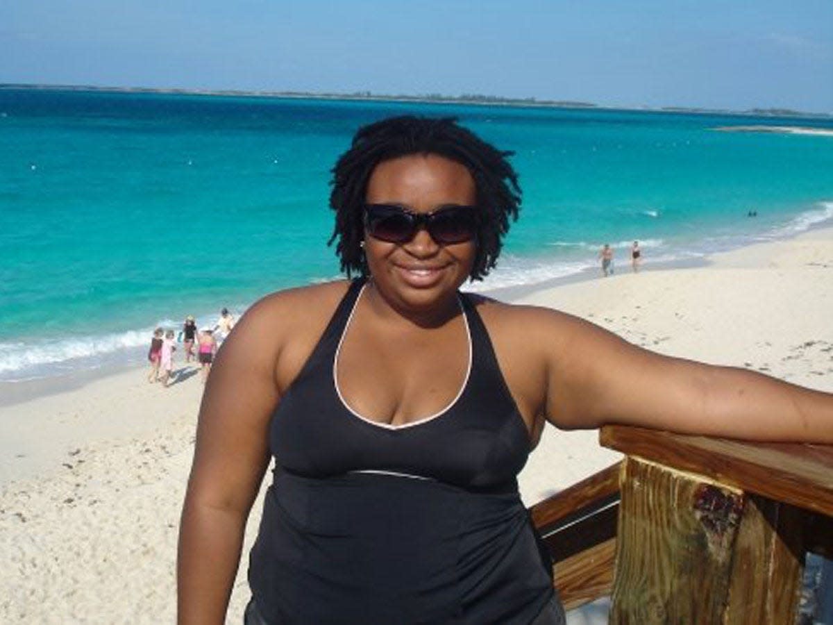 Nicole Bedford smiling on beach