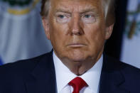 President Donald Trump listens during a multilateral meeting on Venezuela at the InterContinental New York Barclay hotel during the United Nations General Assembly, Wednesday, Sept. 25, 2019, in New York. (AP Photo/Evan Vucci)