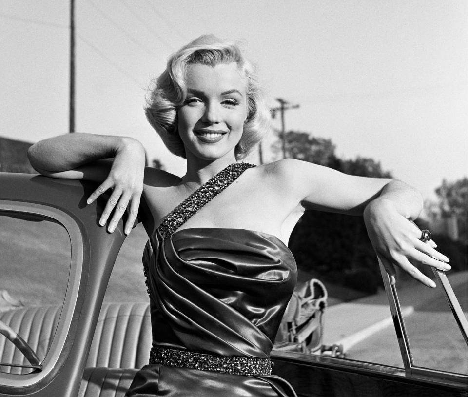 <p>When Marilyn Monroe busted onto the scene in the early '50s, her signature bob with smooth curls became the epitome of glamour and style. </p>