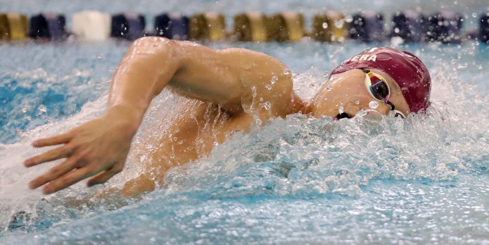 Stow senior Alex Cimera competes in the boys 200-yard freestyle event during the Akron Division I sectional swim meet at the University of Akron's Ocasek Natatorium.