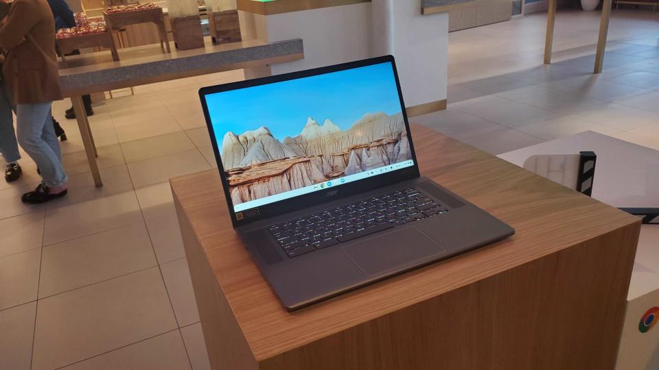 Chromebook Plus laptop on wooden table