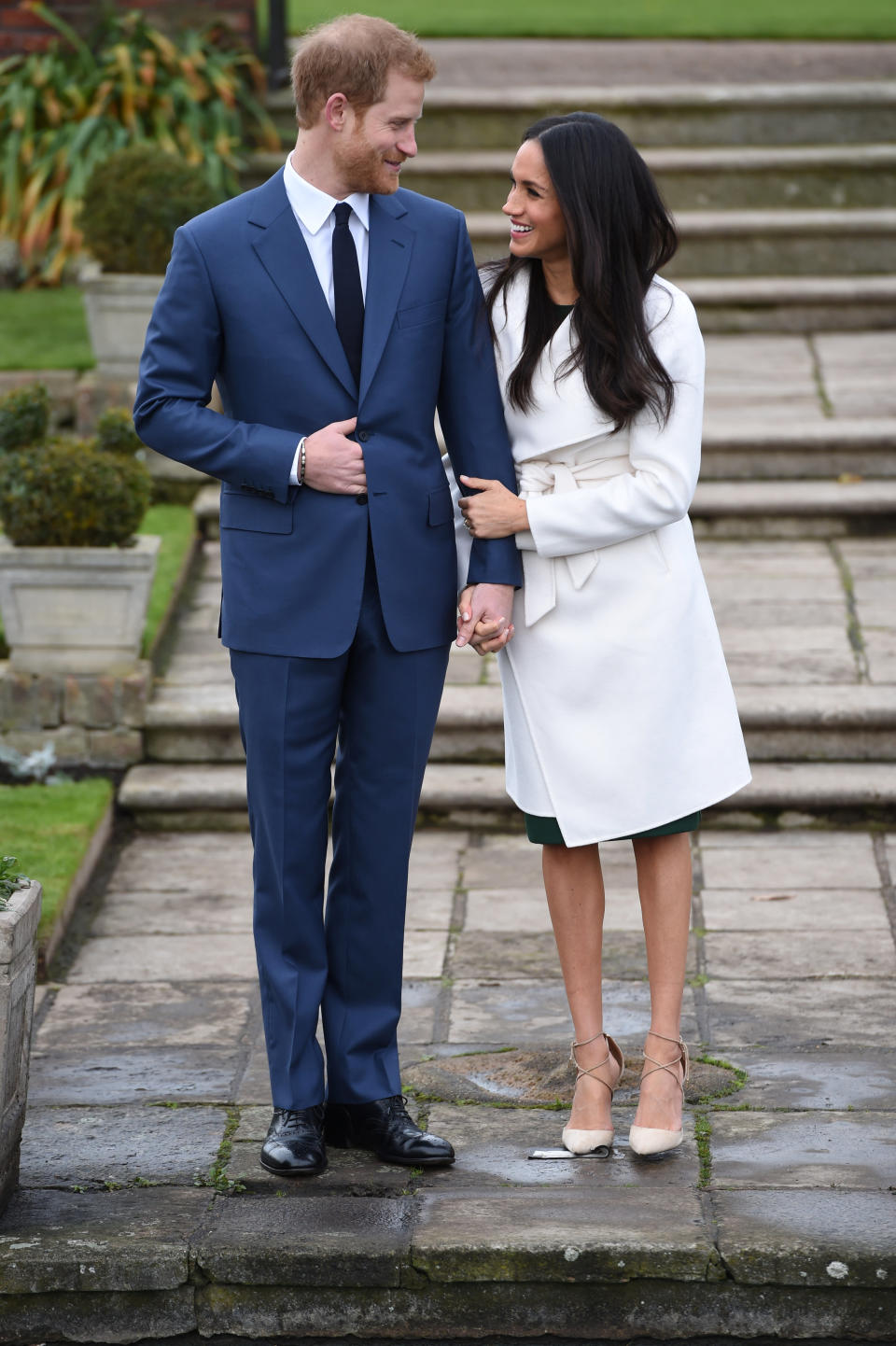 Britain's Prince Harry poses with Meghan Markle in the Sunken Garden of Kensington Palace, London, on Nov. 27, 2017. (Photo: POOL New / Reuters)