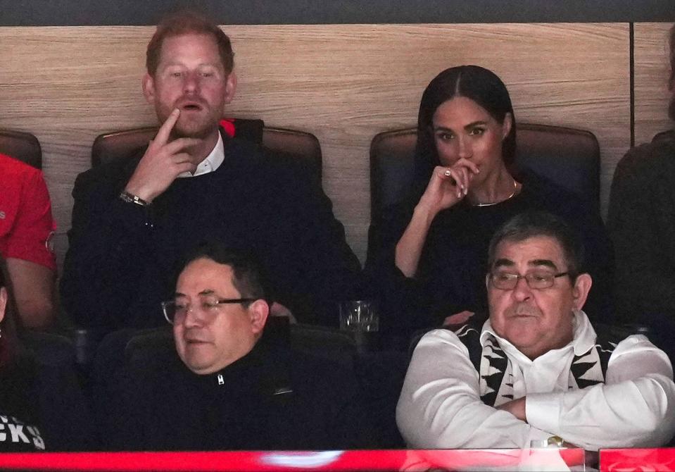 Harry and Meghan in the crowd to watch the match (AP)