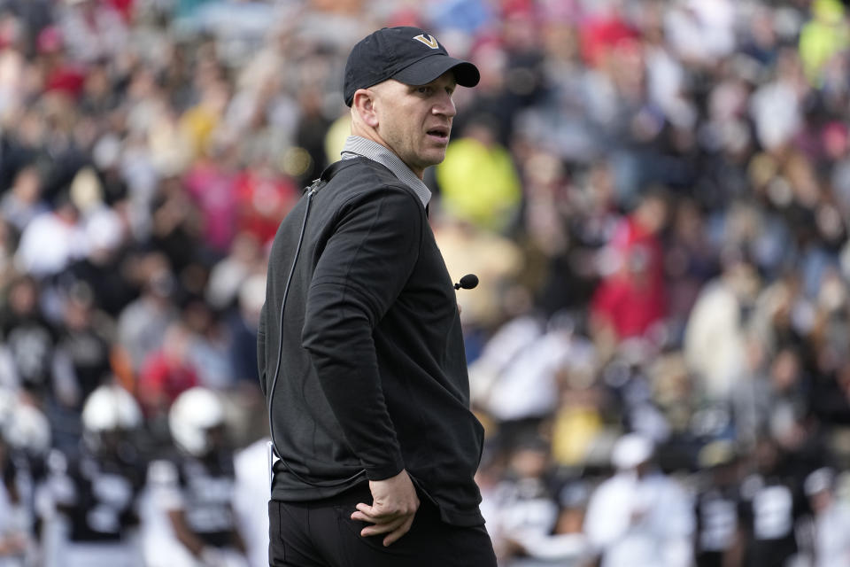 Vanderbilt head coach Clark Lea walks across the field in the second half of an NCAA college football game against Georgia, Saturday, Oct. 14, 2023, in Nashville, Tenn. (AP Photo/George Walker IV)