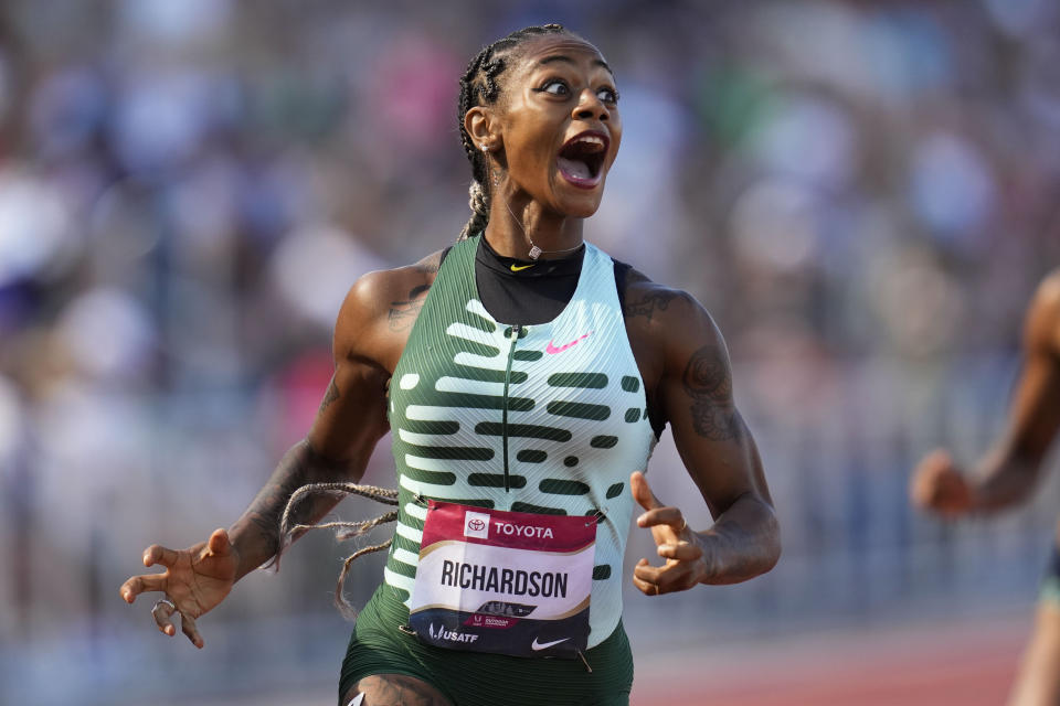 FILE - Sha'Carri Richardson reacts as she wins her heat in the first round of the women's 200 meters during the U.S. track and field championships in Eugene, Ore., Saturday, July 8, 2023. (AP Photo/Ashley Landis, File)