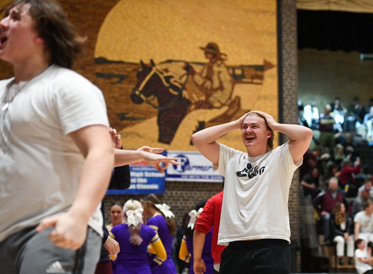 White River fans react to a buzzer-beater shot at halftime in the team's game against De Smet on Saturday, January 22, 2022, in the Hanson Classic at the Corn Palace in Mitchell.