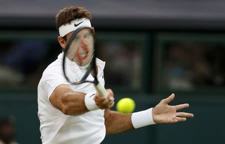 Britain Tennis - Wimbledon - All England Lawn Tennis & Croquet Club, Wimbledon, England - 1/7/16 Argentina's Juan Martin Del Potro in action against Switzerland's Stan Wawrinka REUTERS/Paul Childs