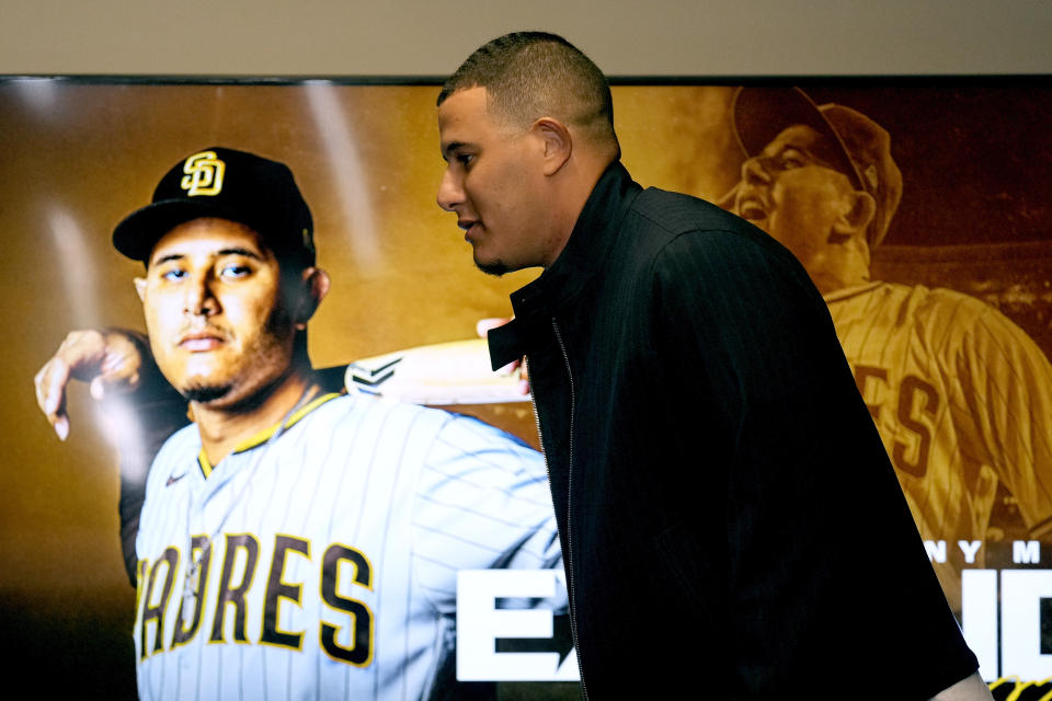 San Diego Padres third baseman Manny Machado arrives at a news conference to discuss his 11-year contract extension Tuesday, Feb. 28, 2023, at the team's spring training baseball facility in Peoria, Ariz. (AP Photo/Charlie Riedel)