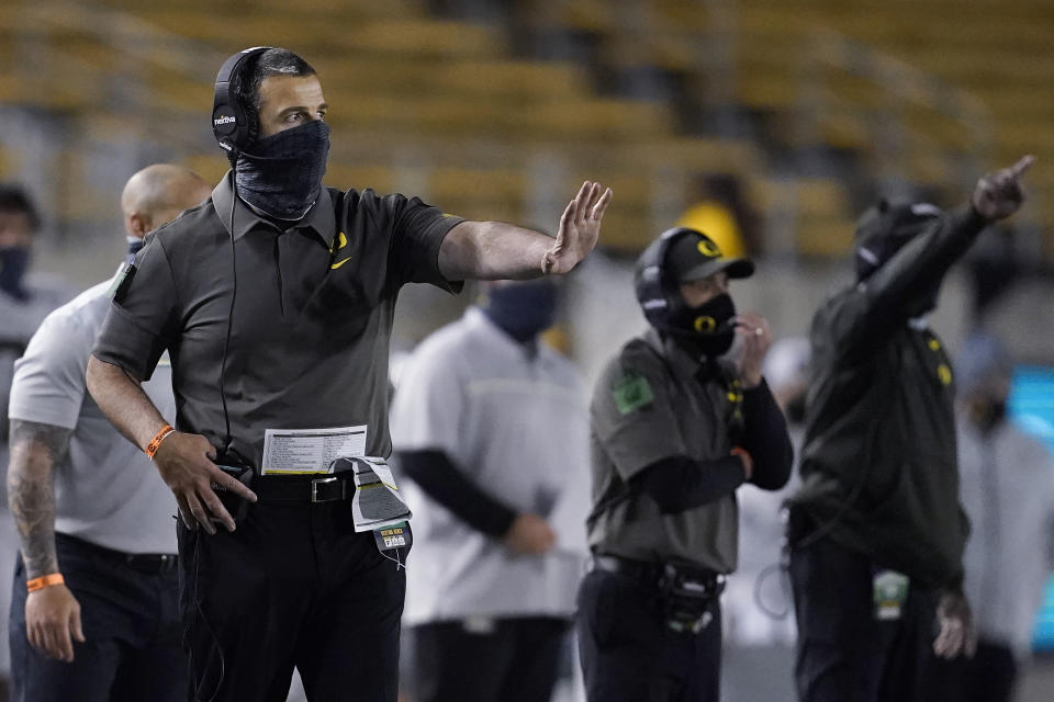 Oregon coach Mario Cristobal gestures during the second half of the team's NCAA college football game against California in Berkeley, Calif., Saturday, Dec. 5, 2020. (AP Photo/Jeff Chiu)