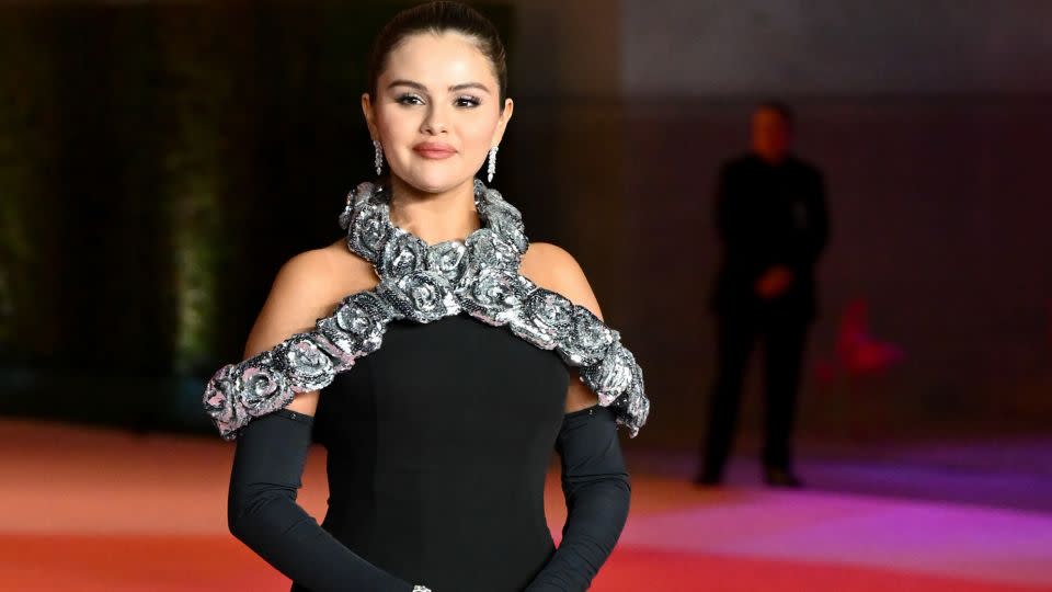Gomez wore her accessories over her opera gloves. - Michael Buckner/Variety/Getty Images