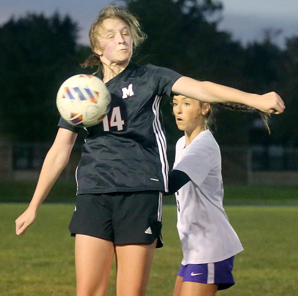 Manchester's Ellah Craddock gets an inbounds pass in front of Triway's Sydney Lendon on Monday, Oct. 3, 2022 in Franklin Township.