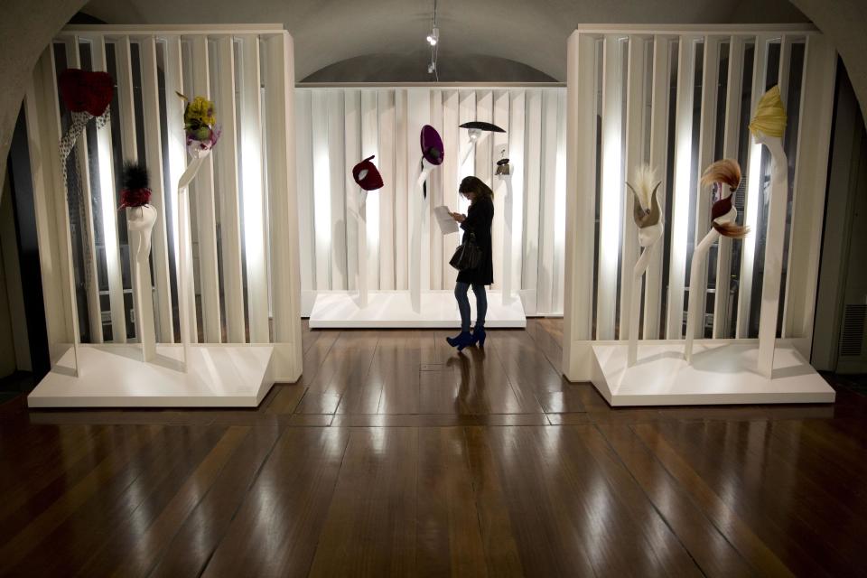 Philip Treacy hats are displayed at the press view of the "Isabella Blow: Fashion Galore!" exhibition in London, Tuesday, Nov. 19, 2013. The exhibition, which runs from November 20 to March 2, celebrates the life and wardrobe of the late British patron of fashion and art who discovered many young fashion design talents. (AP Photo/Matt Dunham)